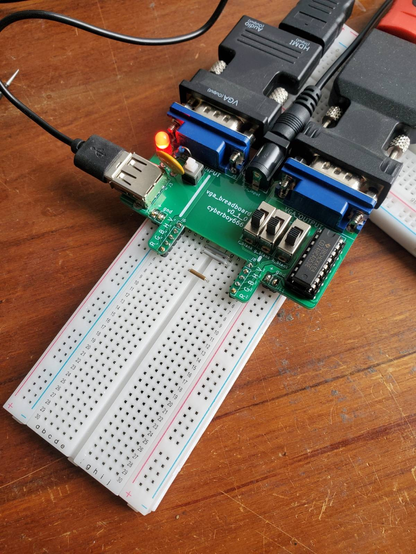 A custom designed breadboard module featuring vga inputs and outputs (which are then converted to hdmi)