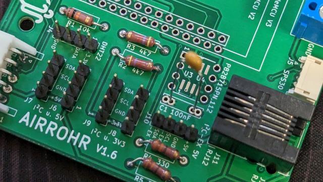 A photo of an airrohr v1.6 PCB with focus on capacitor C1
