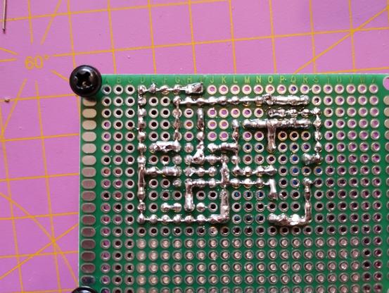 Backside of the perfboard showing the soldering