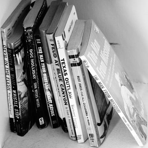 Books of the Wild West on a shelf