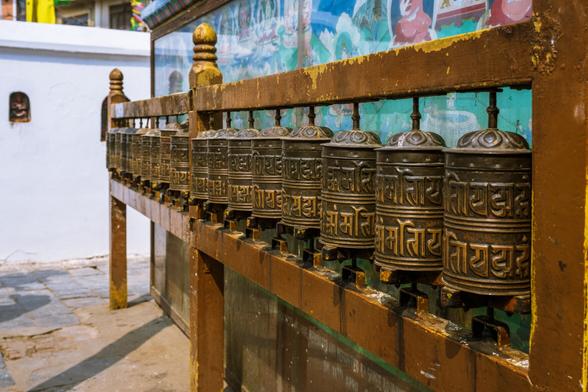 Row of prayer wheels at the Boudhanath Stupa in Kathmandu, Nepal 
Komeil Karimi_20230301_K010053