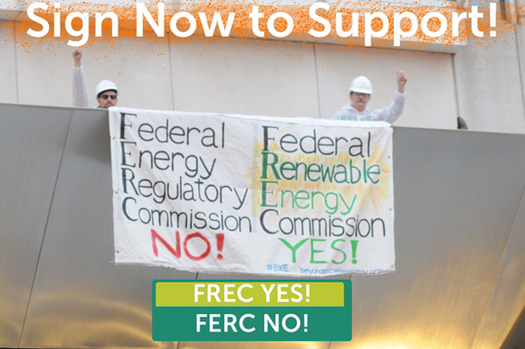 Beyond Extreme Energy climate defenders Drew Hudson and Ted Glick on top of the awning of the #FERC headquarters building after dropping a banner stating 'Federal Energy Regulatory Commission: No; Federal Renewable Energy Commission: Yes!'