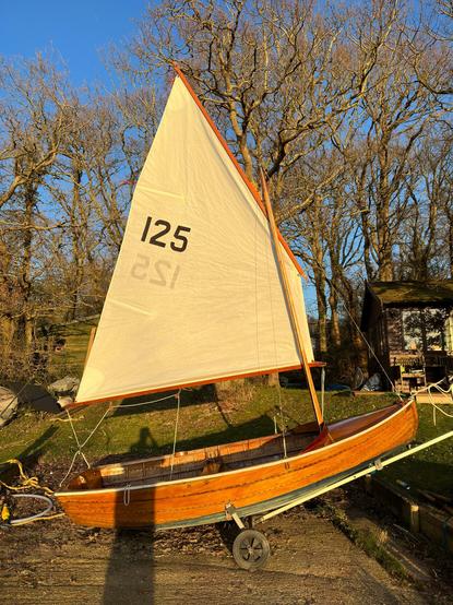 Photo is a bembridge scow sailing dinghy on my slipway