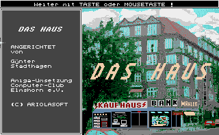 Title screen of the game, showing a coarsely digitized photo of an inner city building partially painted over in a very amateurish manner