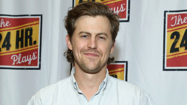 Actor Alex Moffat poses at an event for The 24 Hour Plays.