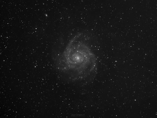 A large spiral galaxy hidden behind the stars and dust of the Milky Way