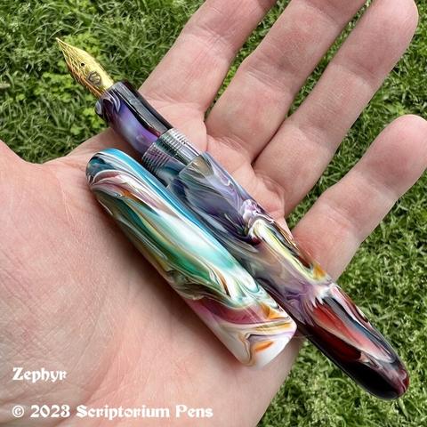 Custom fountain pen made from Primary Manipulation #1, uncapped, held in maker’s hand.