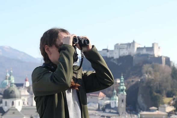Woman with binoculars