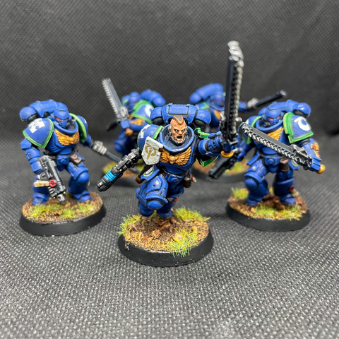 Primaris Assault Intercessors of the Ultramarines 4th Company with their Sgt