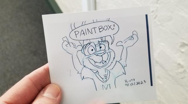 A drawing of Topaz Rabbit holding his arms up saying "Paintbox!" It's printed on photo paper.
