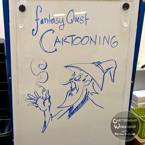 A dry erase board with the title 'Fantasy Quest Cartooning' written and a picture of a long nosed wizard with the classic pointy hat.