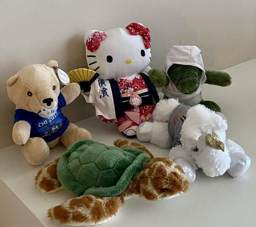 Five toy plushies from previous chi conference merch