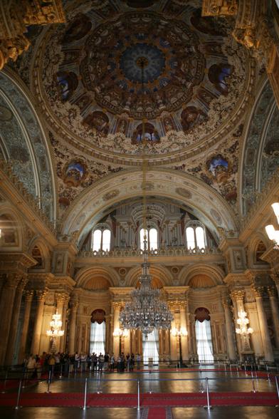 Splendid domed ballroom, with ornate decoration and chandelier, in the Dolmabahce Palace
