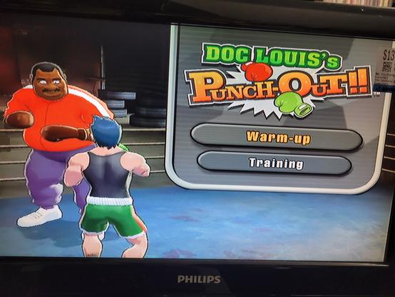The title screen of Doc Louis's Punch Out!!, a Wii Shop exclusive, displayed on a Phillips LCD TV via component cables.
