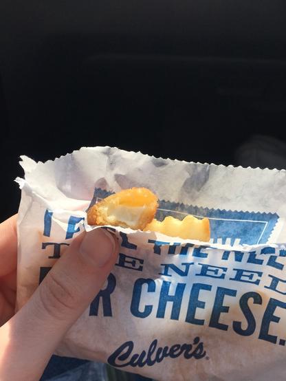 Deep-fried mozzarella (I think) cheese curd in a bag of crinkle-cut steak fries. These are from Culver's.