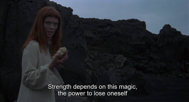 Nico in white among rocks 1972