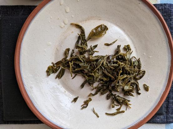 Spent green tea leaves.