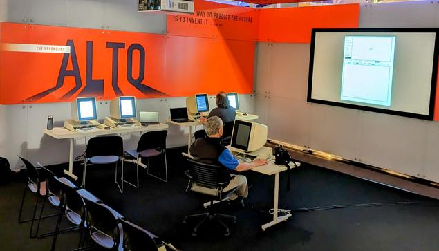 A demonstration room set up with 70s personal computer replicas.