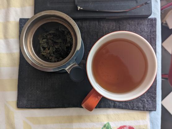 Rolling Thunder tea in an orange mug.