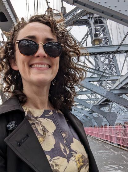 Helen smiling on the Willamette bridge