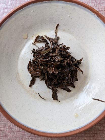 Spent black tea leaves.