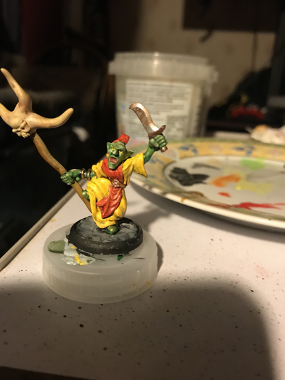 Warhammer roleplay goblin shaman with staff and sword
