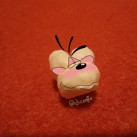 The draw of Diddle (a german comic strip) over the photo of a pop corn