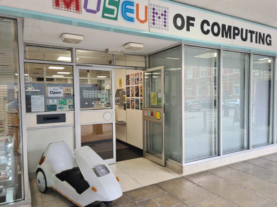 The entrance to the Museum of Computing in Swindon, outside of which is parked a Sinclair C5 electric tricycle.