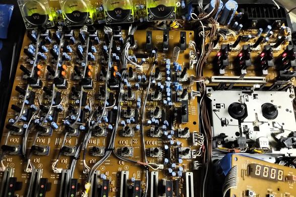 Bare marantz without cover, but all the boards plugged in and laying on top.