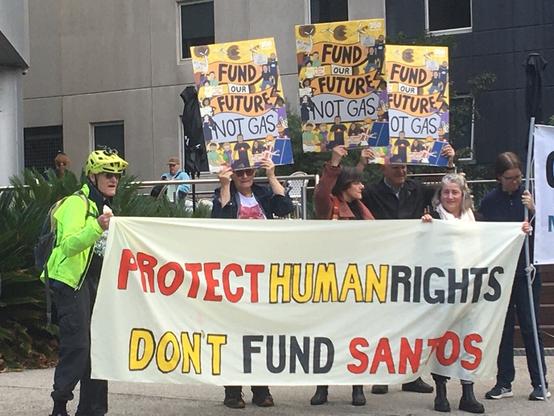 Banner outside South Korean Consulate, Melbourne  regarding funding of Barossa Gas Project: “Protect Human Rights, Don’t fund Santos” smaller signs say : “Fund our future Not gas”