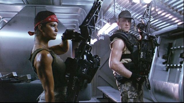 USMC Colonial Marines Vazquez and Drake practicing their form with their Smart Rifles. Aliens, 1986.