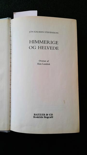 The book Himmerige og helvede, turned to the title page which includes the translator's name - Kim Lembek translated it into Danish.