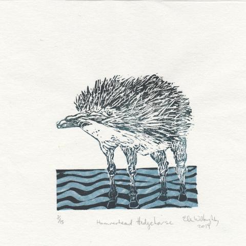 Linocut print (8” x 8” on white washi paper) of an imaginary composite creature in blue-green ink, called the hammerhead hedge horse. The creature is standing in a blue river on its four horse-like legs. Its body core is covered in spikes like a hedgehog. Its head is shaped like a hammerhead shark.