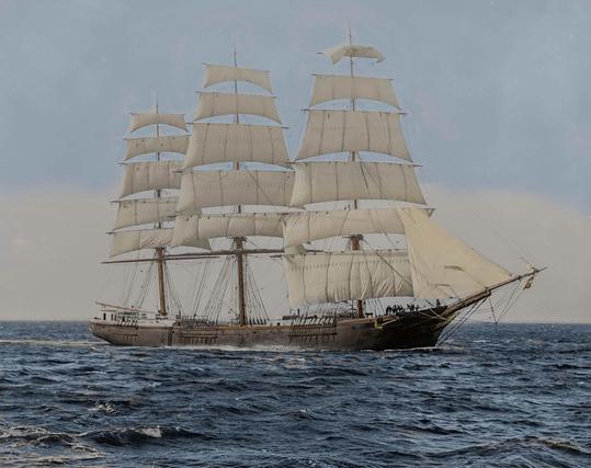 Full view of the Clipper Ship the St David sailing on the ocean.