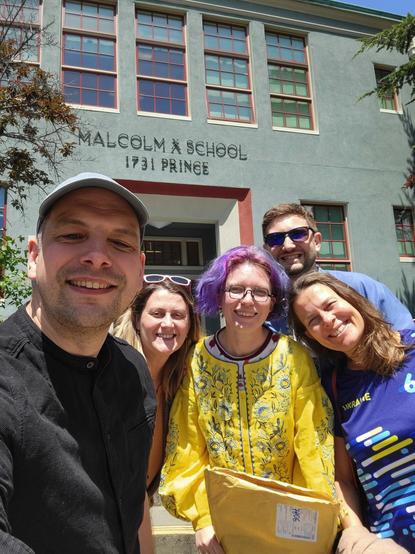 Team SUCHO outside Malcolm X Elementary School in Berkeley