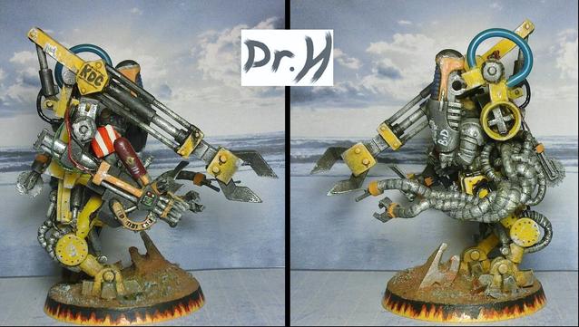 Side views of The Mechanic.
The robot arms consist of an extendable grabber/claw, nail-gun, welding tool, and a multitude of metal tentacles.