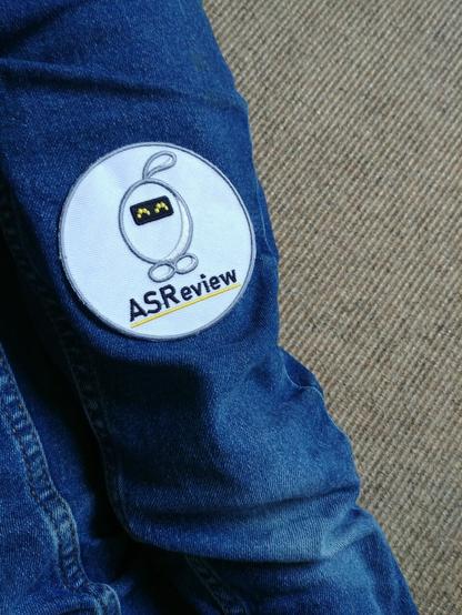 A patch on a jeans with the ASReview logo