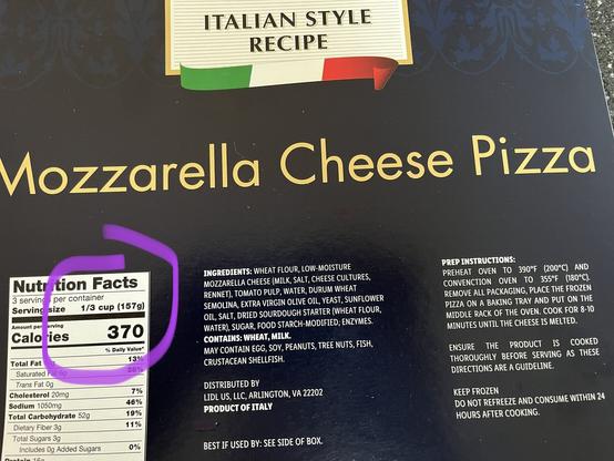 The back of a box of Mozzarella Cheese Pizza from Lidl. The serving size of 1/3 cup is highlighted with a circle.