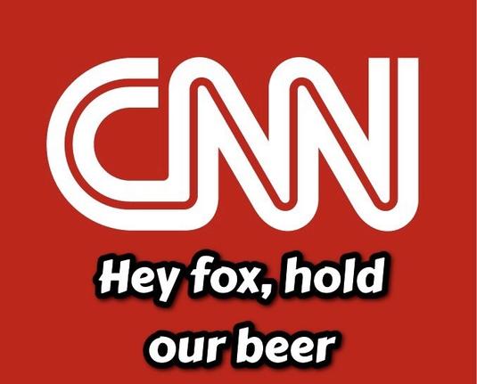 Cnn logo with the words “hey fox, hold our beer” underneath