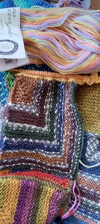 Photo shows my comfort blanket in progress, and all the memories the yarns have :)