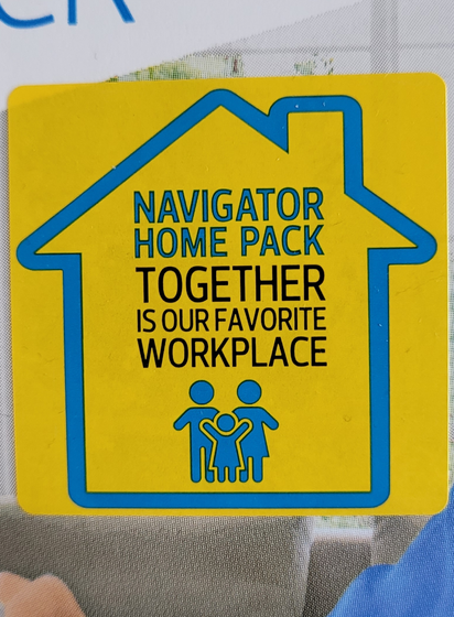 A poorly designed yellow and blue sticker depicting a sterotypical house and family. The text reads "together is our favourite workplace"