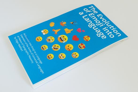 Folded poster with emoji on the cover ordered in a hexagon pattern.