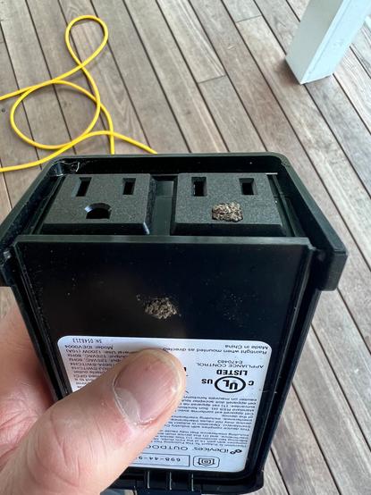 outdoor light switch with mud packed into the ground