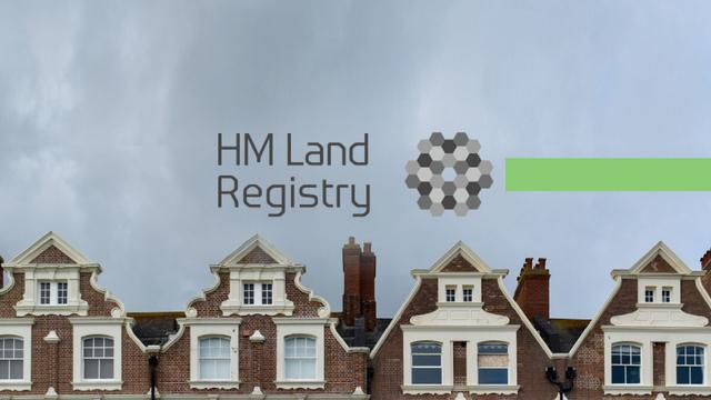 Decorative image. Background photo of a line of the tops of four terraced houses and cloudy sky with in the foreground the HMLR logo and a bold green line from the right image edge to the logo