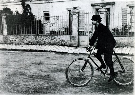 Symbolist poet and playwright Alfred Jarry bicycling in Corbeil, Paris in 1898. Jarry wrote 'How to Construct a Time Machine' in 1899. 

https://Wikipedia.org/wiki/Alfred_Jarry