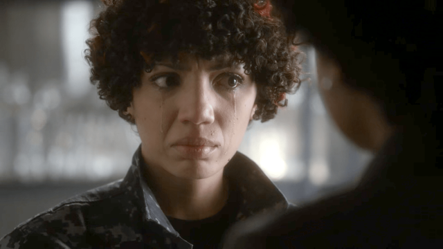 A screengrab from a Fringe episode showing autistic Agent Astrid Farnsworth from the Amber World.