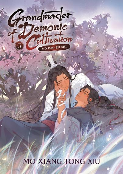 The cover of Grandmaster of Demonic Cultivation Vol. 5. Features Wei Wuxian and Lan Wangji enjoying a tender moment in a grassy field, with some trees in the background.
