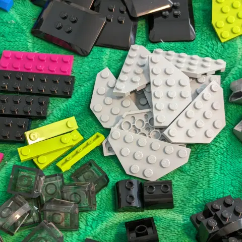 A variety of black and grey LEGO pieces