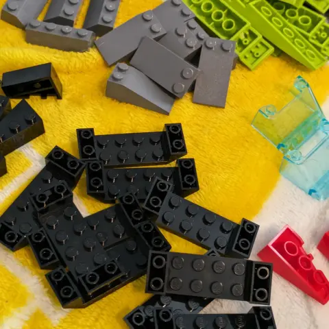 A variety of black and grey LEGO pieces