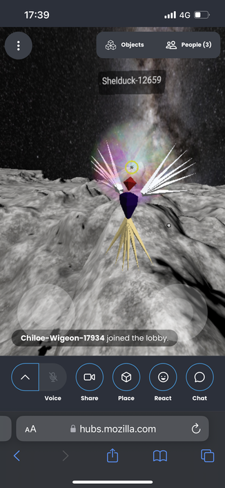 Another avatar that looks like some kind of angel with spiky wings and tail is on the asteroid surface inside the VR space.